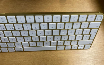 Apple Magic Keyboard with Touch ID: Bluetooth, rechargeable. Works with Mac computers silicon; British English, white keys with varities of Colours - 10