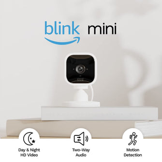 Blink Mini | Indoor plug-in pet security camera, 1080p HD day and night video, motion detection, two-way audio, easy setup, Alexa enabled, Blink Subscription Plan Free Trial — 1 camera (White) - 1